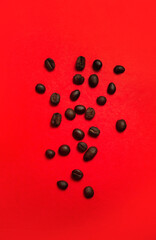 coffee beans close-up on a red background
