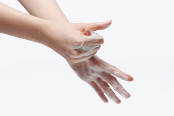 women washing hands on white background.