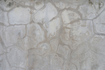 The old whitewashed surface had a pattern similar to that of a map.