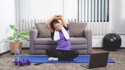 Obraz premium Young beautiful asian women wearing fashion sports wear doing exercise on mat indoor training at home, Sport and recreation concept