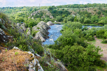 Fototapeta premium The view on Southern Bug river in in bug Guard national nature park with Integral water rapids at spring in Migeya, Mykolaiv Region, Ukraine.