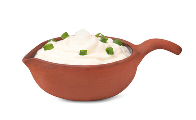 Delicious sour cream with chives in sauce boat on white background
