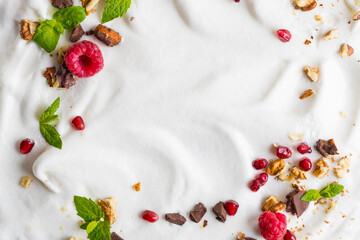 Whipped cream of egg whites with chocolate, nutmeg and raspberries.