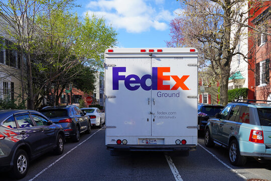 WASHINGTON, DC -2 APR 2021- View of a delivery truck from Federal Express (Fedex) on the street in Georgetown, Washington DC.