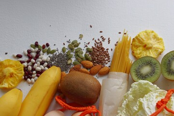 The concept of zero waste. Eco-friendly shopping, flat styling. Vegetables, fruits, eggs, pasta, legumes in a shopping bag on the table.