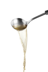 Dipper pouring noodle soup on white background, Soup for sukiyaki from chicken and fish