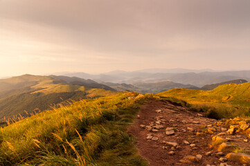 Naklejka na ściany i meble Sunrise in the Bieszczady Mountains as seen from the top of Rozsypaniec, Bieszczady Mountains