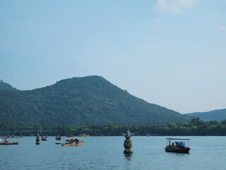 Fototapeta na wymiar Small boats on the lake in Hangzhou OLYMPUS DIGITAL CAMERA