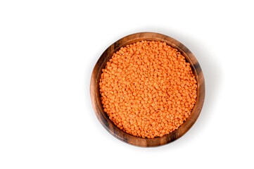 Bowl of red lentils isolated on white