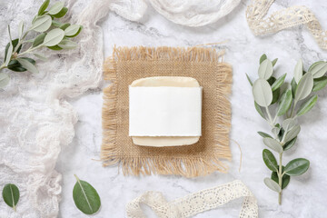 Soap bar on a sacking with eucalyptus branches around