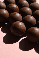 Set of chocolates in the shape of a ball, conceptual