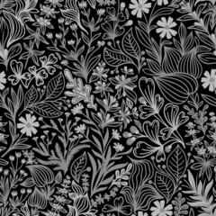 Seamless pattern with beautiful wildflowers and plants on a black background in vector