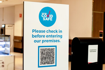 Mandatory COVID Safe QR-code check in and check out at all indoor venues in NSW. Sign with QR code in the shopping centre - obrazy, fototapety, plakaty