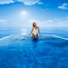 Beautiful sexy tanned woman bikini model in pool on Maldives island. Young glamour girl in swimsuit...