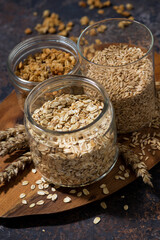 healthy foods - oatmeal, cereal and homemade granola, vertical