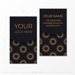 Black business card template with luxury gold ornaments. Print-ready business card design with vintage patterns.
