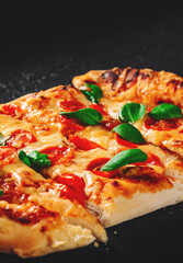 flatbread Pizza with Mozzarella cheese, Tomatoes, pepper, Spices and Fresh Basil. Italian pizza....