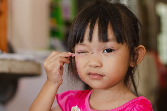 Portrait image of 3-4 years old. Asian child girl make up on her face. Beautiful kids.