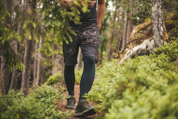Hard training in the forest. Sports marathon, obstacle course.