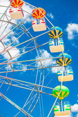 Ferris Wheel with Blue Sky and clouds