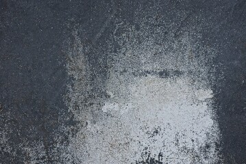 gray black stone texture from dirty old concrete wall in a fence on the street