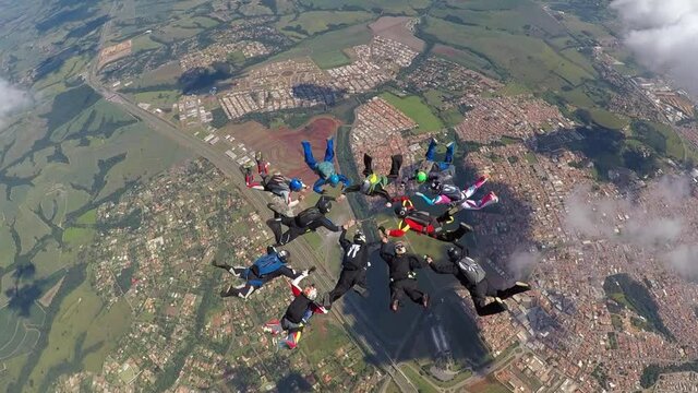 Skydivers making a formation big way