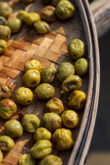 fresh plum fruit in bamboo basket