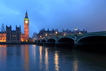 Fototapeta na wymiar Palace of Westminster at dusk viewed from across the river Thames, London, UK