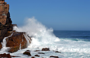 waves crashing on rocks