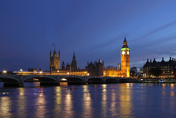 Naklejka premium Palace of Westminster at dusk, viewed from across the river Thames, London, UK