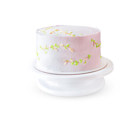 Wedding pink cake on a stand isolated on white background