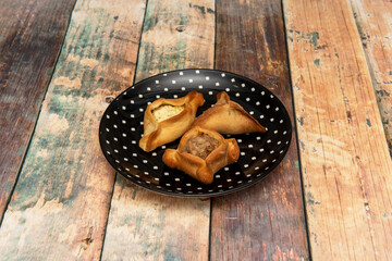 Fatayer, Lebanese dumplings, one with meat, another with cheese and another with vegetables. Typical appetizers of Lebanon