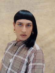 A portrait of a non-binary Latinx person 