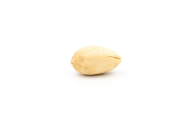 Close-up of tasty pistachios, isolated on the white background.