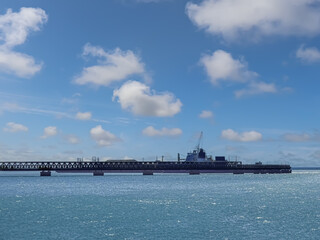 Obraz premium A pier for shipping industrial cargo by sea.