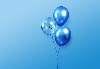 festive birthday party or holidays  background with 3 balloons close up. three blue  balloons...