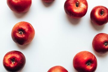 Ripe juicy red rayal gala apples on grey backgroung. Top view. Autumn composition.