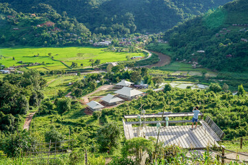 Fototapeta na wymiar Beautiful aerial view of rice paddy field in Sapan village, Nan province, Thailand.