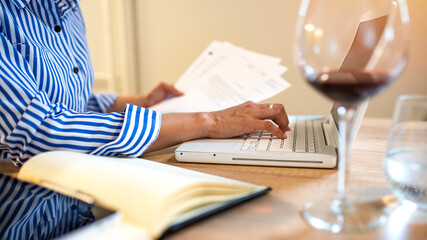 Shot of an unrecognizable woman working from home. Hands of women who use laptop keyboard Concept of email delivery and online technology usage. Hands that make productivity happen