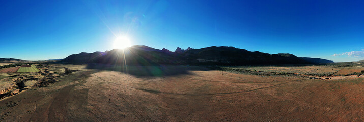 Fototapeta na wymiar 180 Sunrise over Zion Natl Pk from New Harmony Utah
