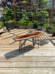Live edge walnut bench outdoors