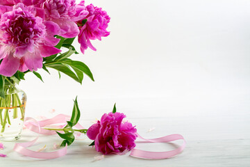 Gorgeous pink peonies with a satin ribbon.