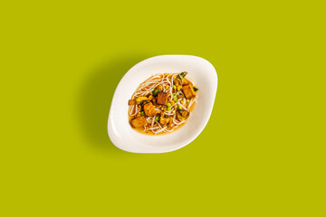 ramen noodles on light green surface