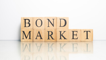 The name Bond market from wooden letter cubes. finance and economy.