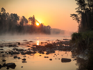 Naklejka premium sunrise over the river