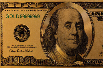 golden 100 US dollar banknote