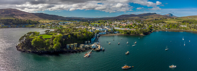 A panorama aerial view eastward towards Portree on the Isle of Skye, Scotland on a summers day