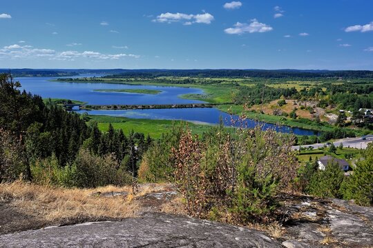 View of summer Karelia from height of hillfort on Mount Paaso near town Sortavala