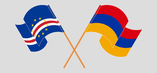 Crossed and waving flags of Cape Verde and Armenia