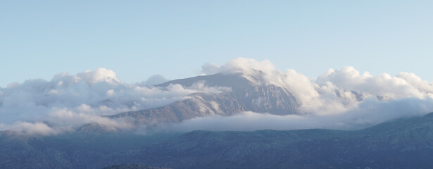 Fototapeta na wymiar Lasithi Plateau mountain landscapes with cloudy sky on Crete Island in Greece.
